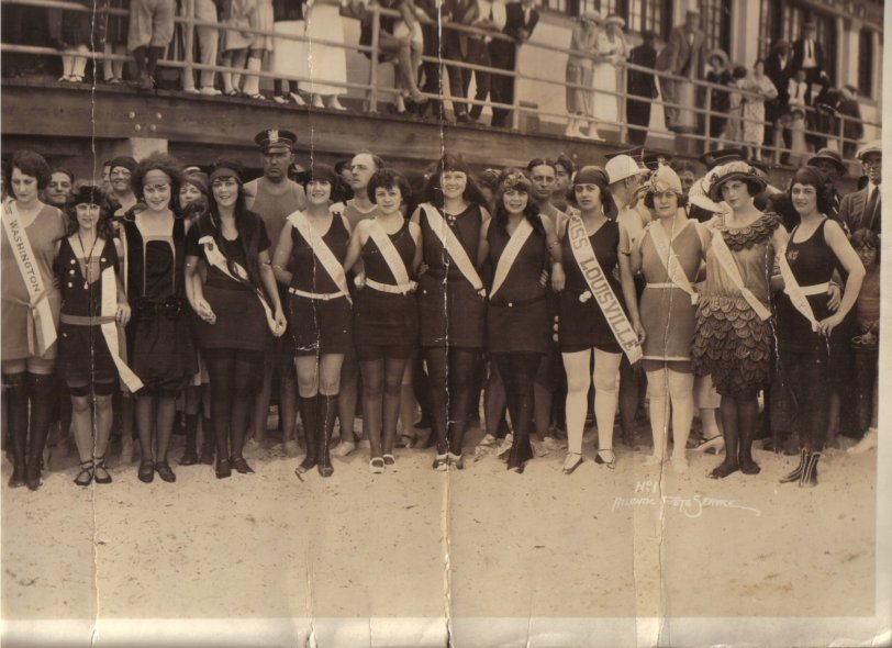 The original photo is about 24 inches long.  Only half the line up is in this scan.   Grandma cut out one of the contestants on the far left (not pictured here) I'd LOVE to know what ticked her off so much!  Grandma Marjory is the lady to the right of the center crease.